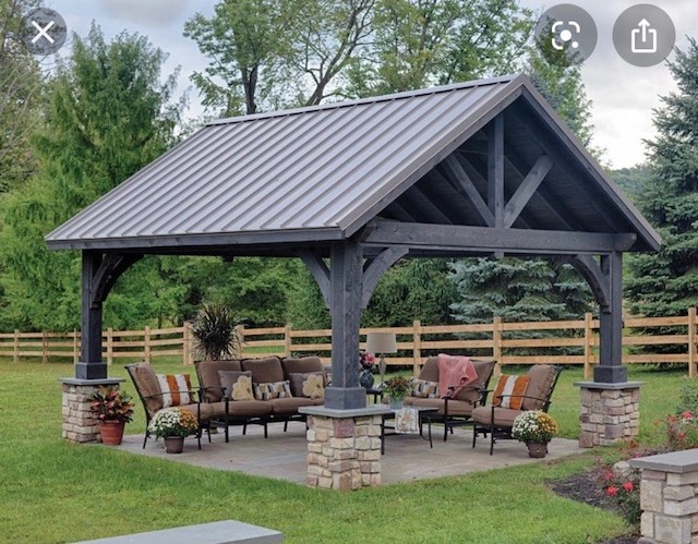 photo of outdoor shelter with couch seating